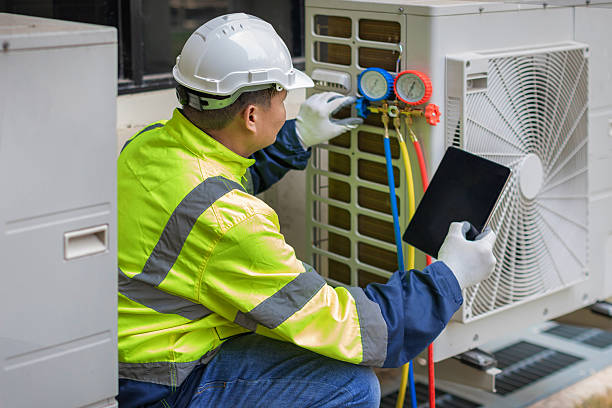 Professional Hvac technician working in Wayland, MA